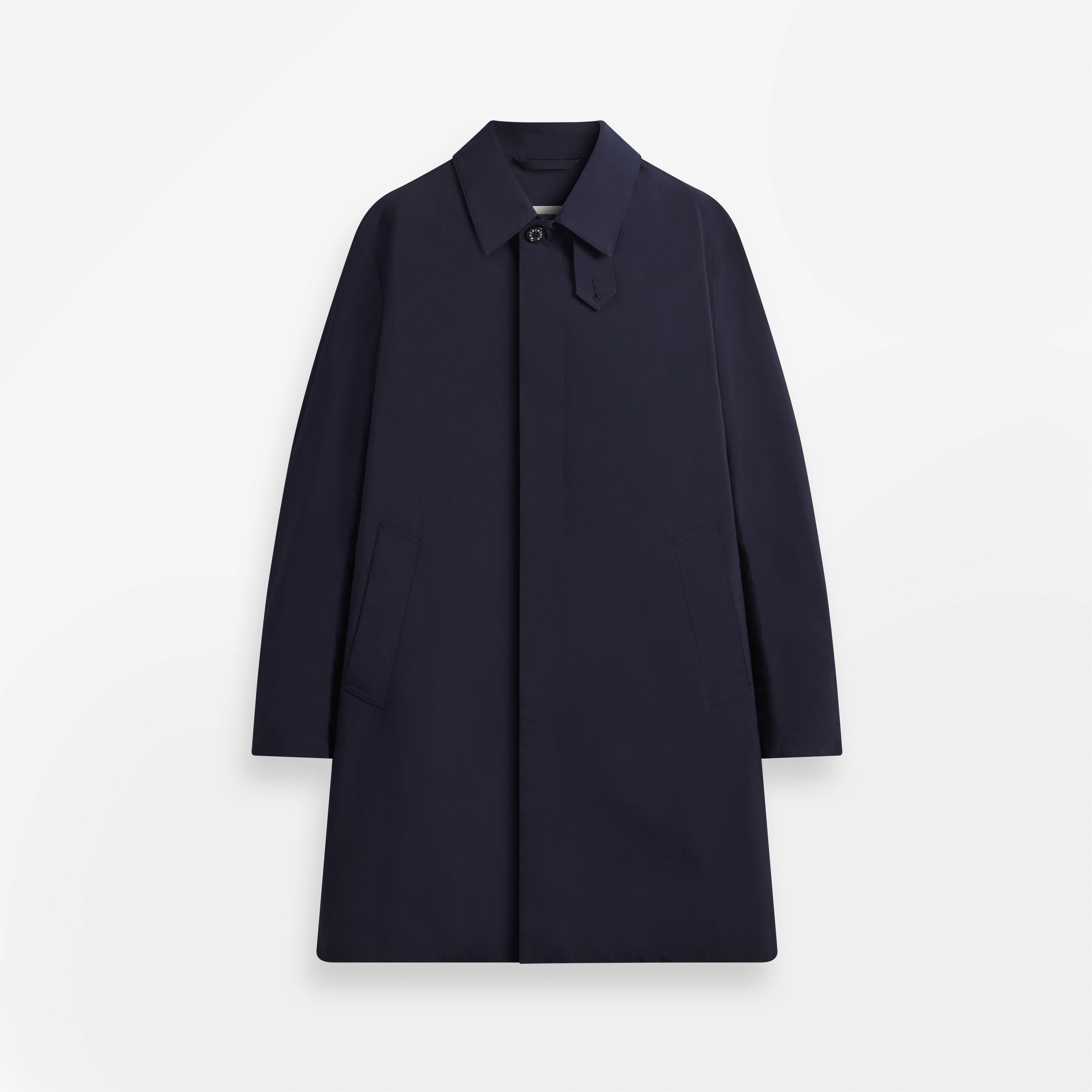 A navy half-length raincoat with a concealed button placket and throat latch, shown from the front.