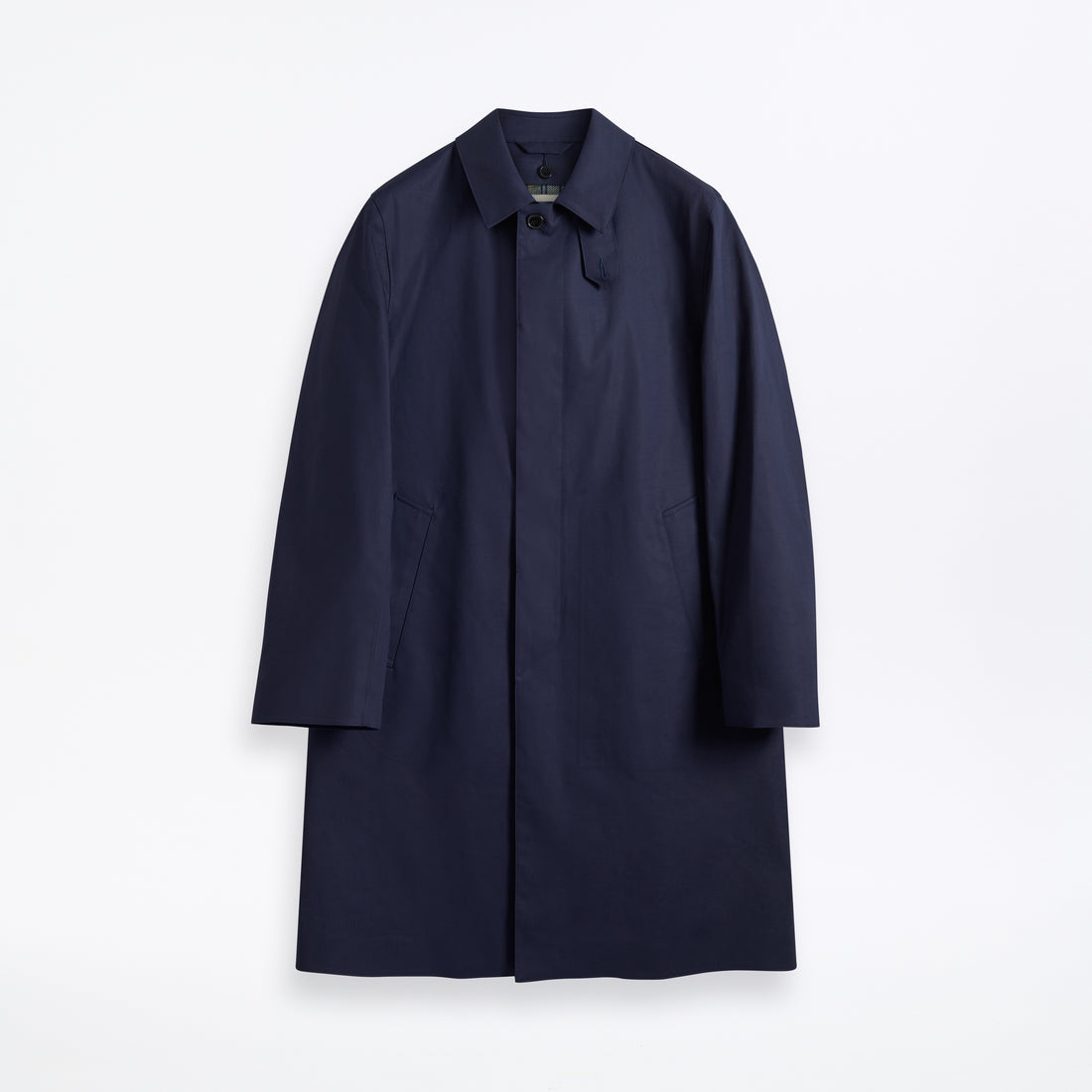 Navy mac coat with a small collar and a concealed single-breasted front